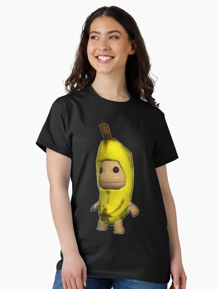 Aperçu 3 sur 7. T-shirt classique avec l'œuvre sackboy à la banane créée et vendue par ailynh-awley.
