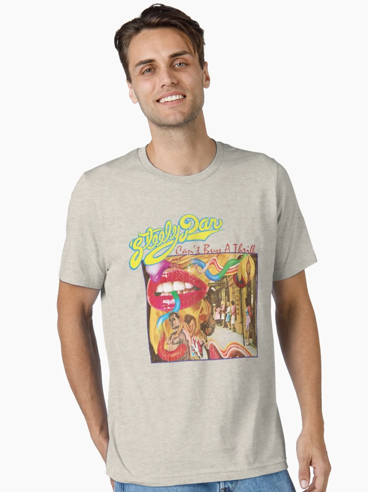Aperçu 2 sur 7. T-shirt essentiel avec l'œuvre Steely Dan: Can't Buy A Thrill créée et vendue par brianhillDESIGN.