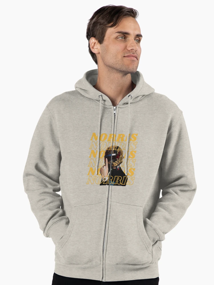 Imagen 2 de 6, Sudadera con capucha y cremallera con la obra Vibraciones de campeón mundial de Lando Norris – Diseño para aficionados a la F1, diseñada y vendida por HotGirlsWatchRacing .