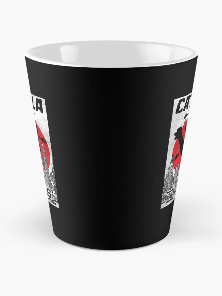Imagen 2 de 4, Taza de café con la obra Catzilla, diseñada y vendida por Le-Freak.