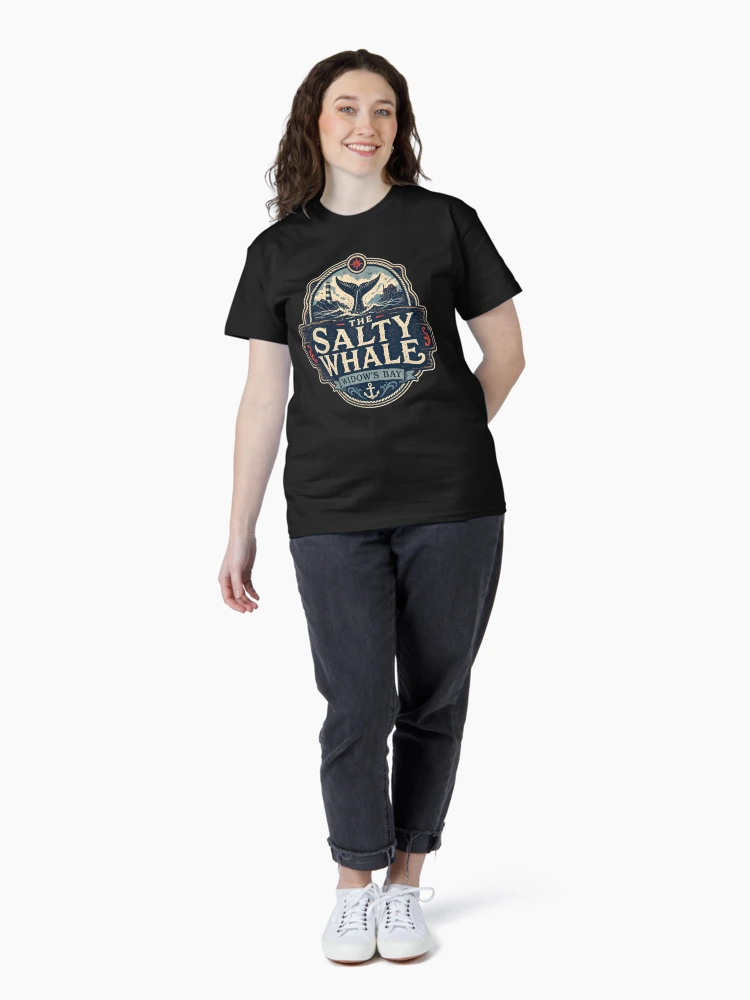 Aperçu 4 sur 7. T-shirt classique avec l'œuvre Art de voyage rétro esthétique horrifique de Widow's Bay créée et vendue par trailblazer-tee.