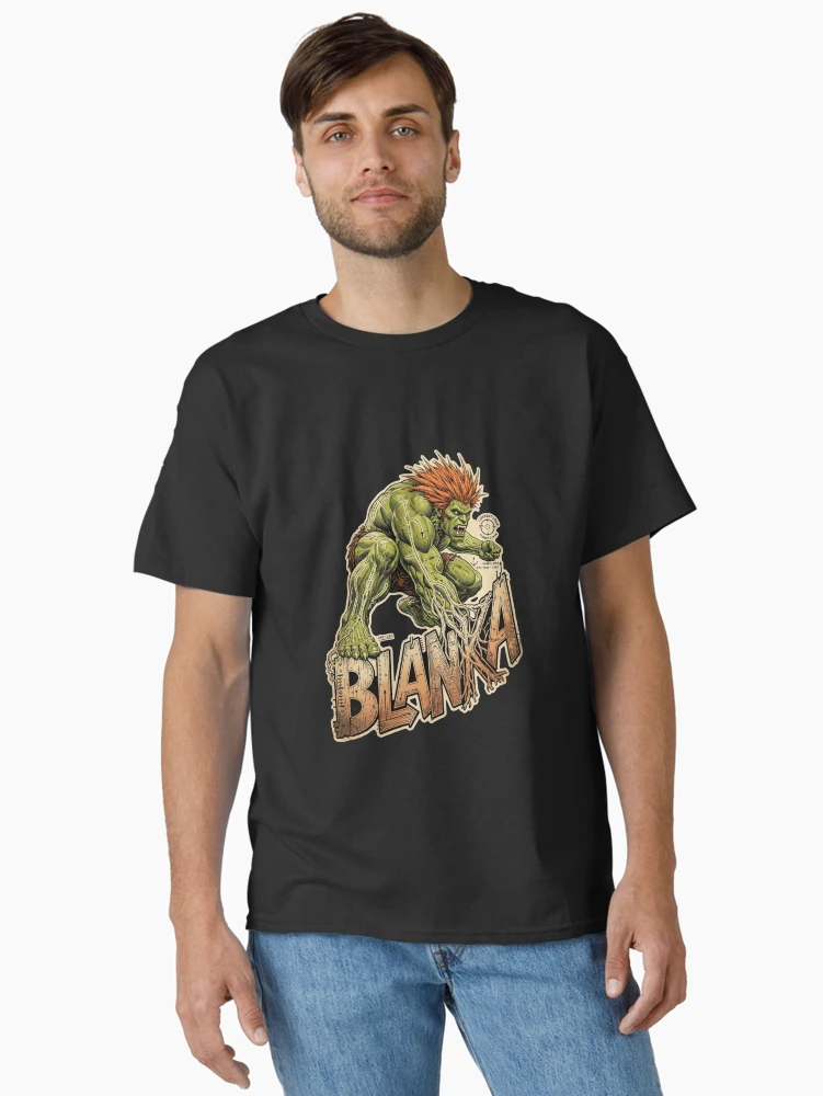 Aperçu 2 sur 7. T-shirt classique avec l'œuvre Design de Blanka dans Street Fighter, Illustration de Blanka la Bête, Graphisme de Blanka dans Street Fighter, Illustration de Blanka pour jeu de combat, Tonnerre Électrique, Attaque Roulante, Cadeau de jeu d'arcade, Fan art Capcom créée et vendue par Typologystudios.