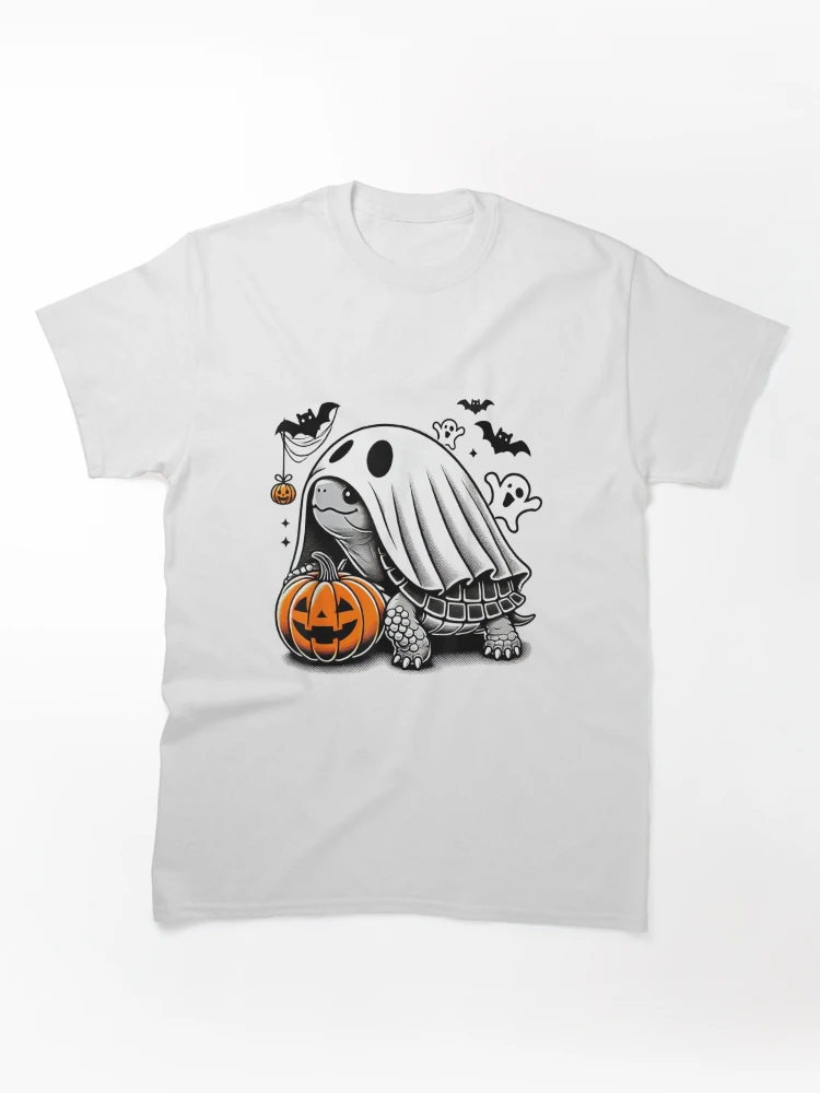 Aperçu 1 sur 7. T-shirt classique avec l'œuvre Déguisement de tortue fantôme citrouille pour Halloween créée et vendue par Suzu Comena.