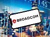 Broadcom logo on smartphone in front of blurred background of city skyline