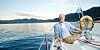 Grey haired man on a yacht