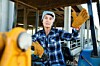 farmer sitting on a tractor at the cowfarm