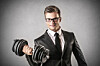 Suit lifting weight, photo via Shutterstock