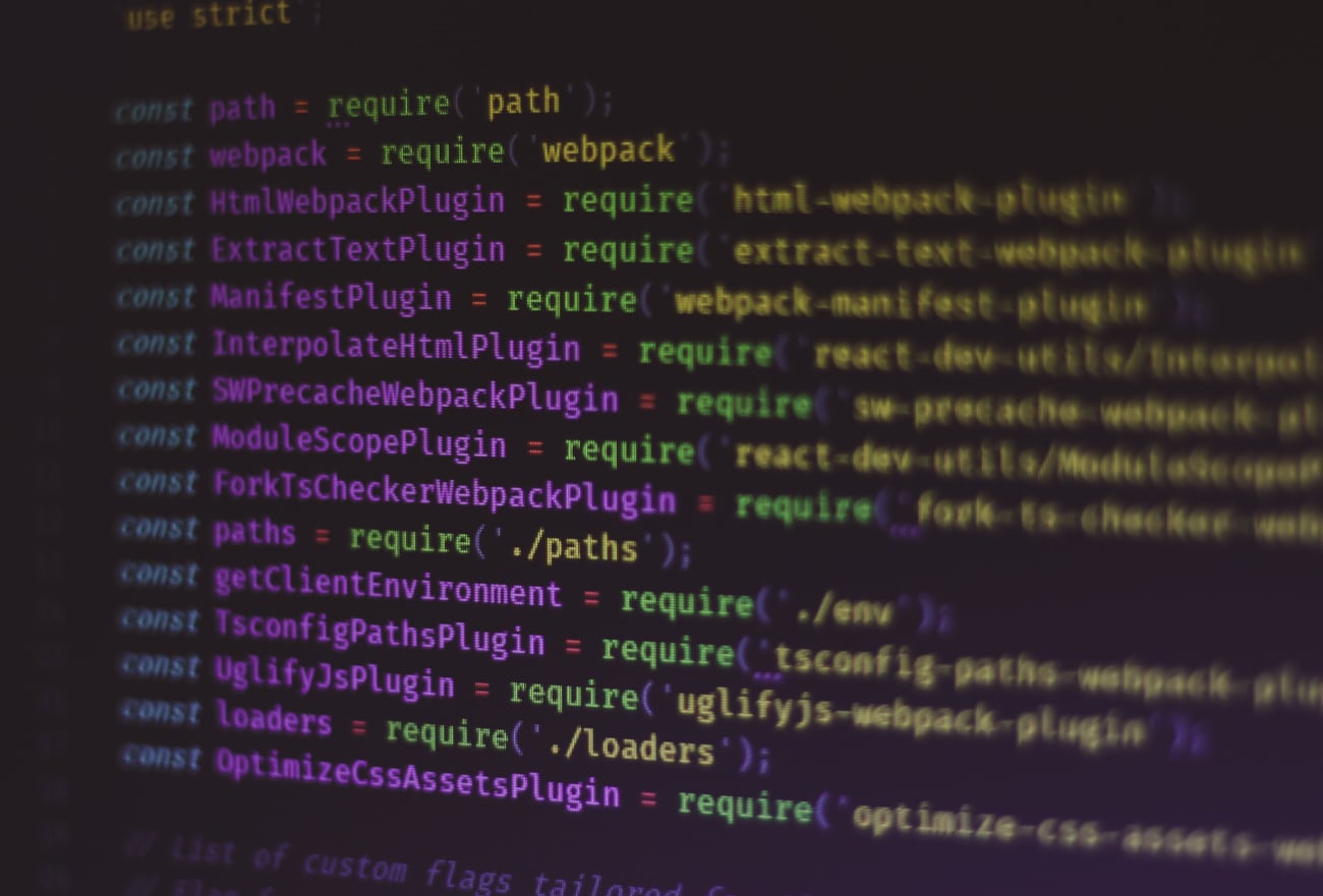 Photo of a webpack configuration file in a code editor on a computer screen.