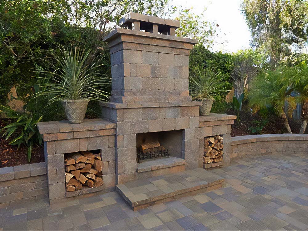Outdoor fireplace, paver patio, retaining wall