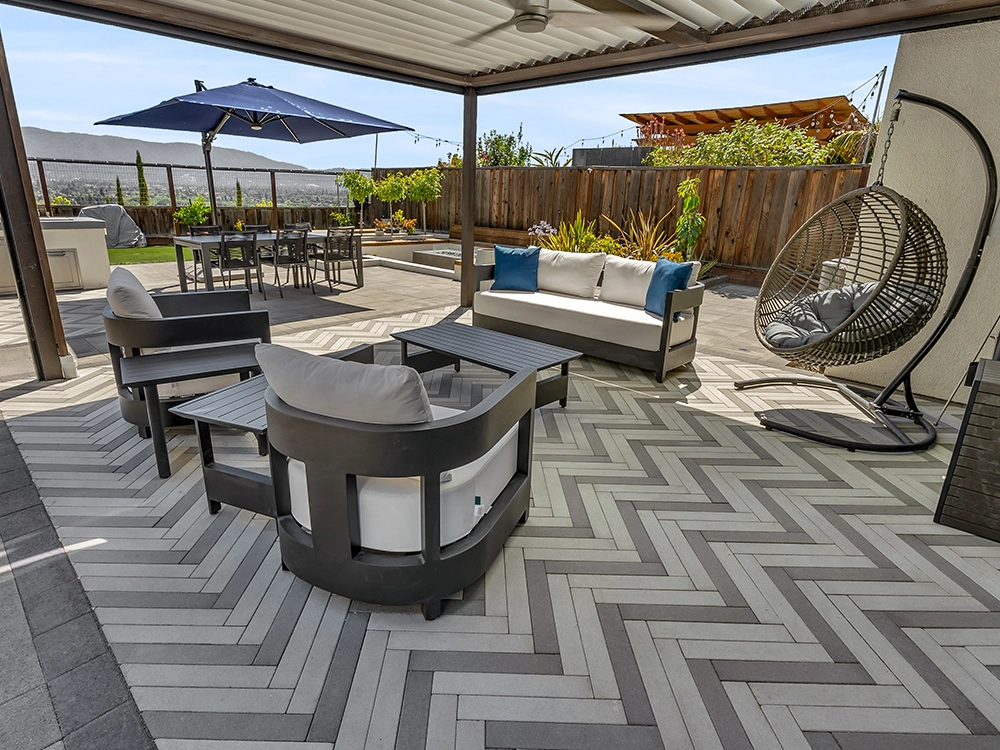 Beautiful paver patio with zigzag pattern.