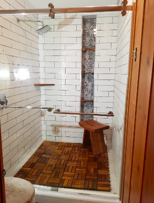 Reviewer's shower in with the tiles on the bottom