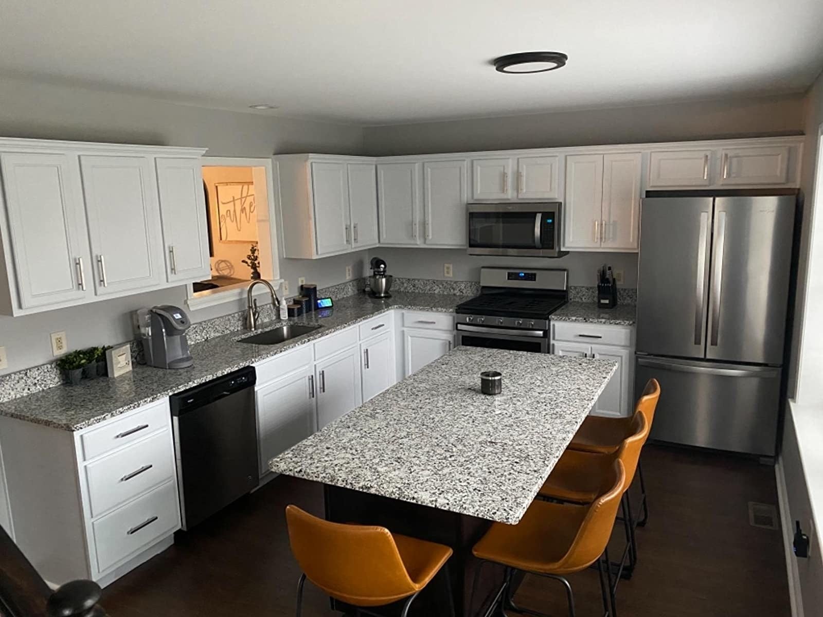 after reviewer image of cabinets now painted white