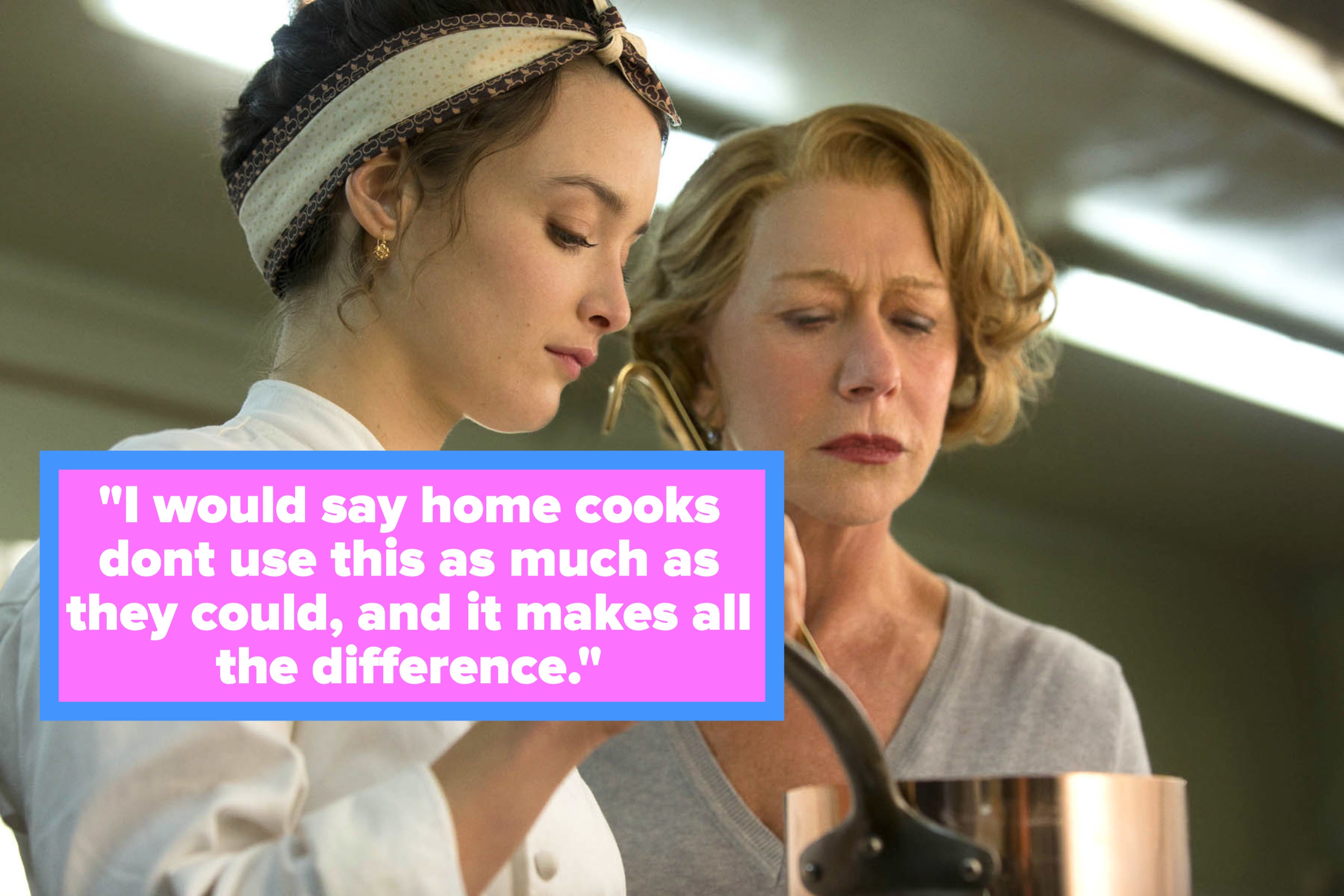 Two unidentified women, one in a chef's outfit, appear focused as they cook together