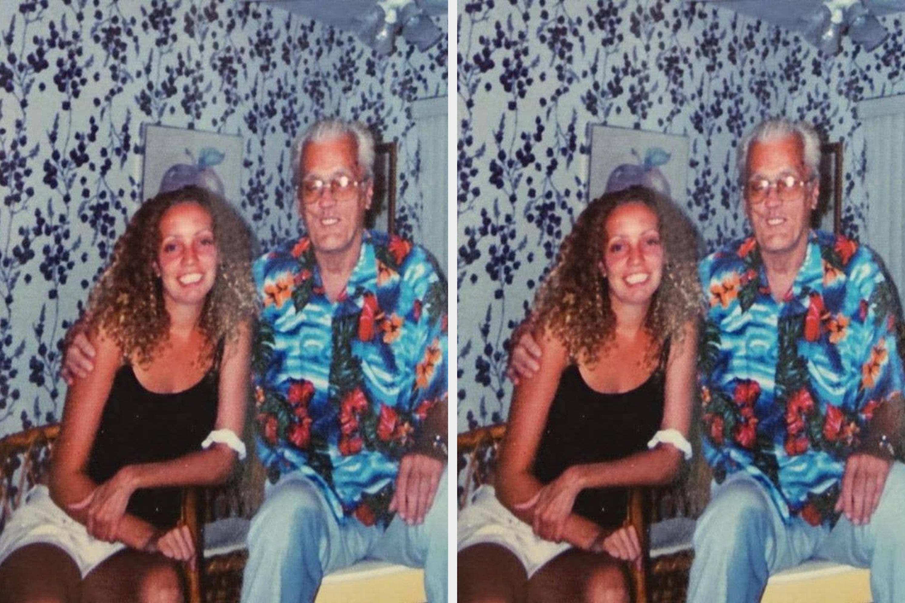 A young woman with curly hair and an older man with glasses and a floral shirt smile while sitting together