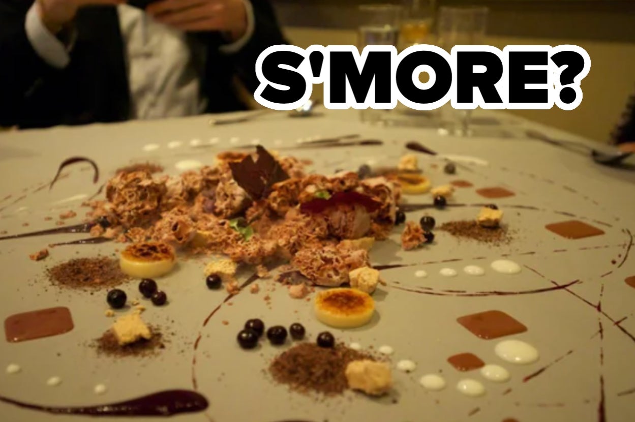 Gourmet dessert with chocolate, cream, and caramelized elements artistically arranged on a plate. Text overlay reads, "S'MORE?"