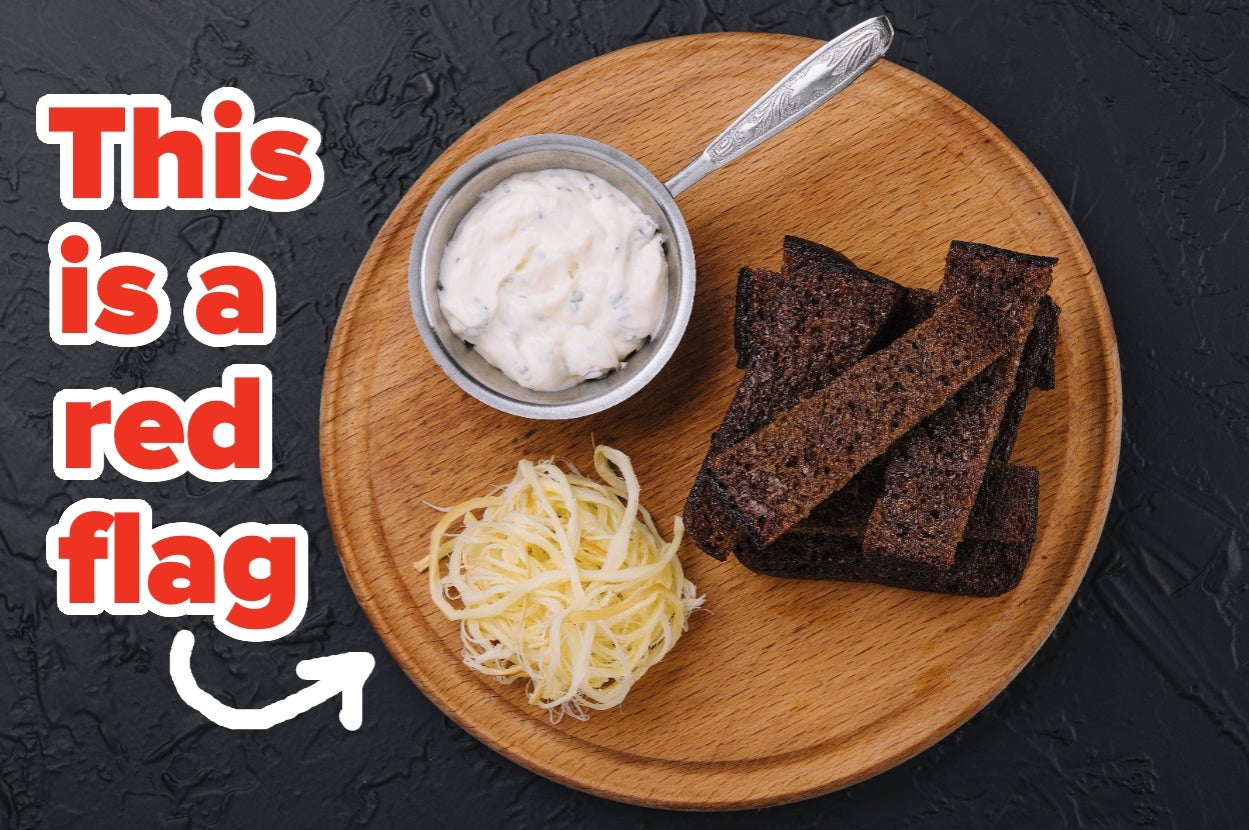 Plate with dark bread, grated cheese, and a dip. Text reads, "This is a red flag."