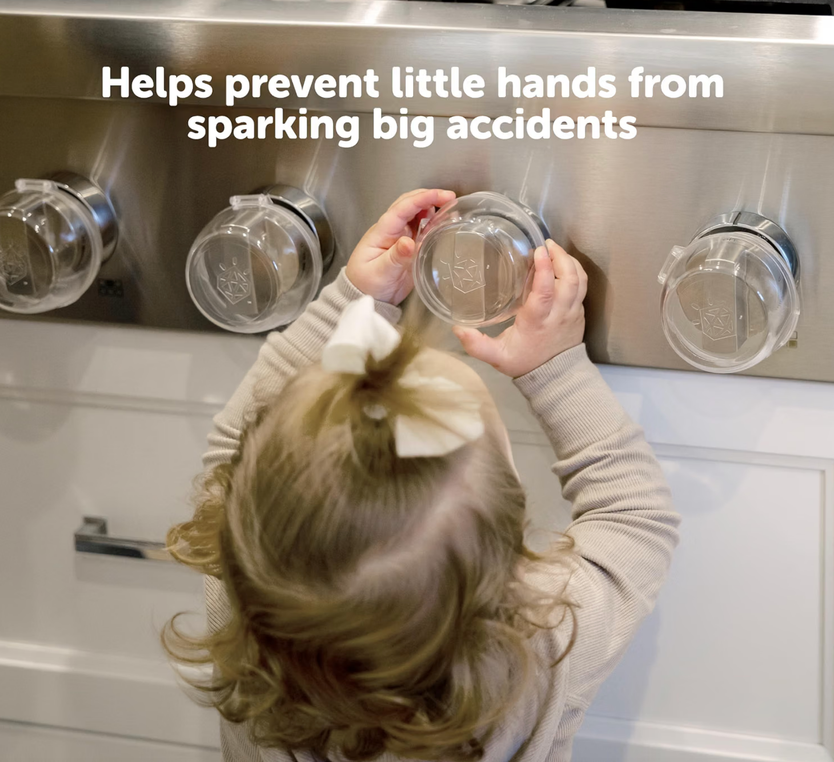 Child proofing stove knob covers in use, with child unable to turn knobs. Text: