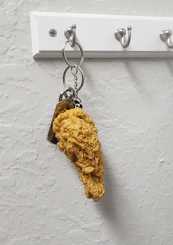 reviewer's chicken wing keychain on key hook