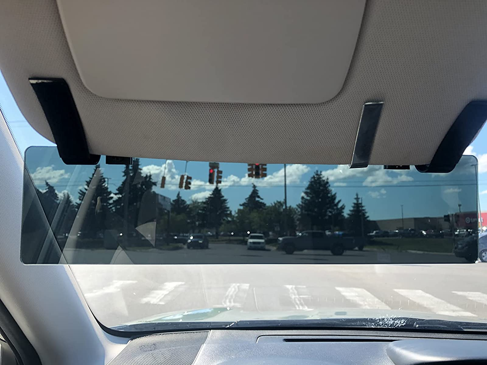 a reviewer photo of the polarized visor installed in a car