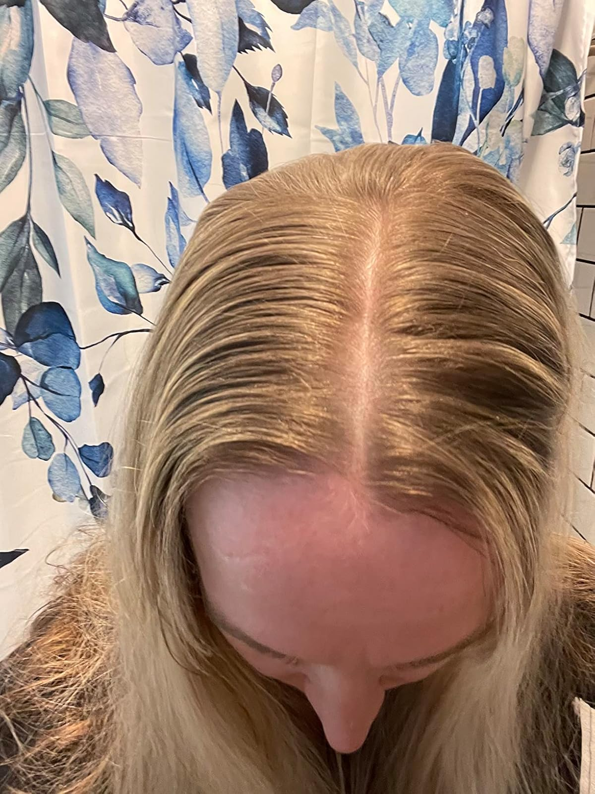 Same reviewer's hair after using mattifying shampoo powder to show oil removal