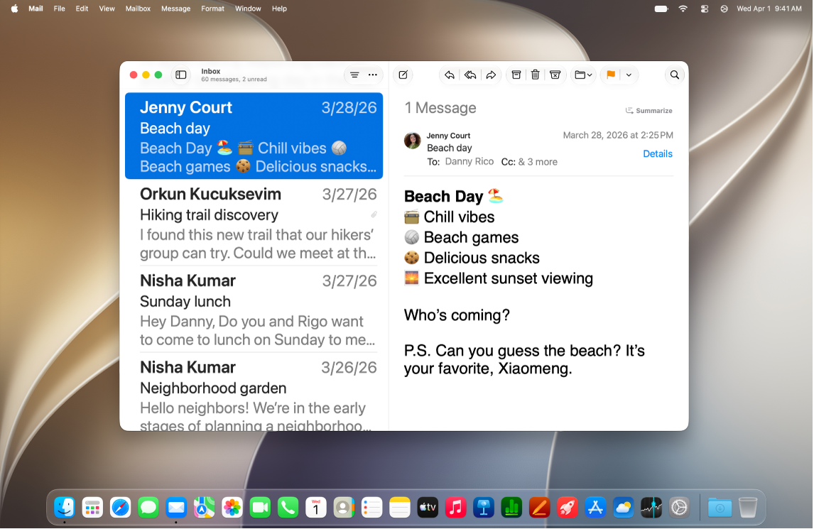 La fenêtre Mail est ouverte sur le bureau. Les e-mails sont affichés avec un texte de grande taille.