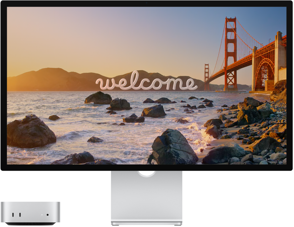 Mac&nbsp;mini рядом с дисплеем.