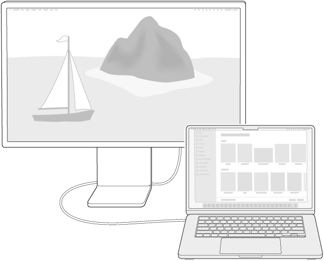 MacBook Airに接続されたディスプレイ。デスクトップが両方の画面に拡張されています。