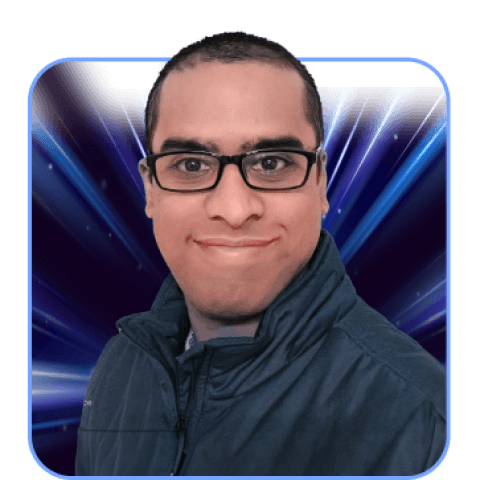Man in glasses with blue background.