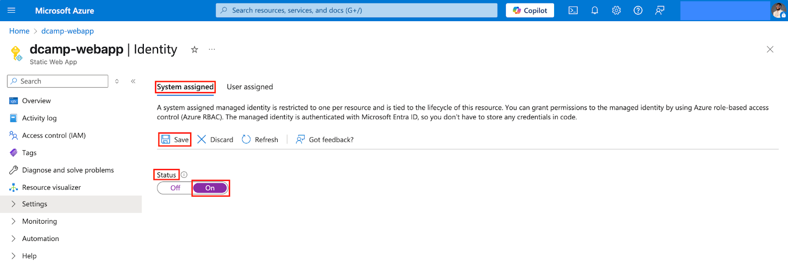 Screenshot of the System assigned tab in Azure App Service Identity settings. The Status toggle is set to On, and the Save button is visible.
