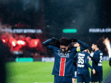 a soccer player with the number 35 on his jersey