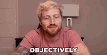 a man in a pink shirt is smiling with the words " objectively " behind him