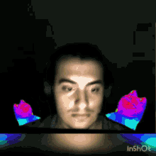 a man 's face is shown in a video that says inshot on the bottom