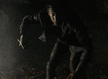 a man in a dirty shirt is screaming in the rain with the word kepler in the bottom right corner