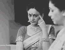 a black and white photo of two women with the website www.sonyliv.com