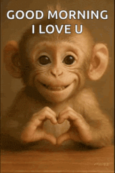 a monkey is making a heart shape with its hands and says good morning i love u .