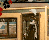 a woman in a hat and scarf is standing in the doorway of a yellow bus
