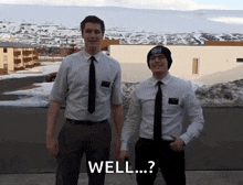 two men in suits and ties are standing next to each other with the words well written on the bottom