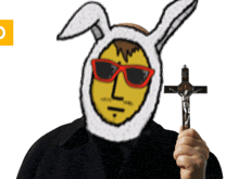 a man wearing a bunny mask holds a cross in front of his face