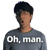 a man wearing glasses and a gray sweater says oh man