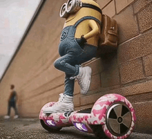 a minion is riding a hover board in front of a wall