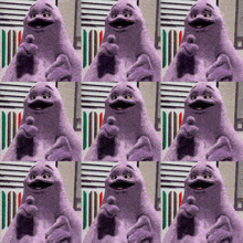 a purple cartoon character with a big mouth