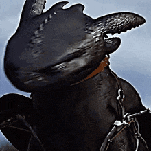 a toothless from how to train your dragon with a large mouth