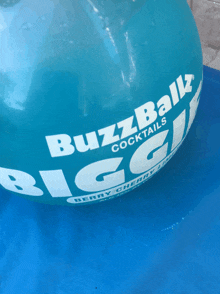 a blue bottle of buzzball biggin berry cherry flavored cocktail