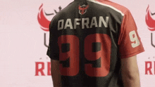 a man is wearing a jersey with the name dafran and the number 99 on it