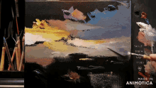 a painting is being painted with the words made in animotica visible