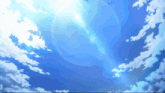 a blue sky with white clouds and the sun shining through