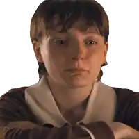 a woman with her arms crossed looks angry