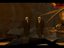 a screenshot of a video game shows two robots standing next to each other with a red sign above them that says recording