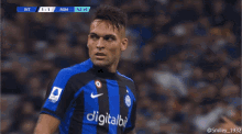 a soccer player wearing a jersey that says digitalbi