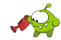 a green cartoon character is holding a red trophy in his hand .